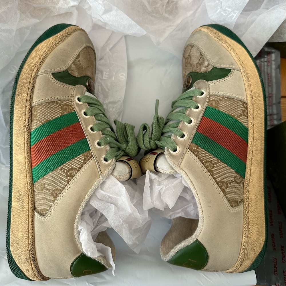 - Authentic Gucci sneakers slightly worn twice . Final sale no return